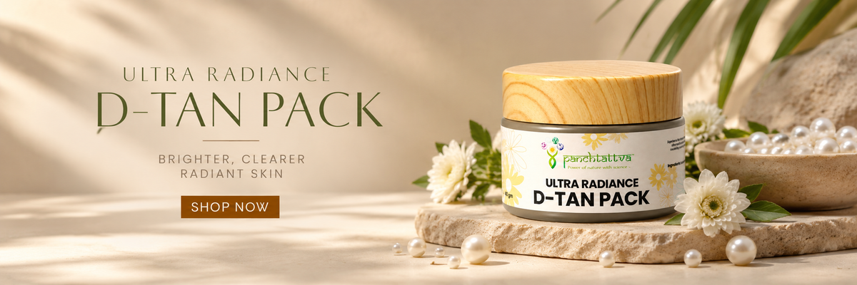 A jar of Panchtattva Ultra Radiance D-Tan Pack is displayed on a stone slab with white flowers and pearls, set against a warm beige background with promotional text.